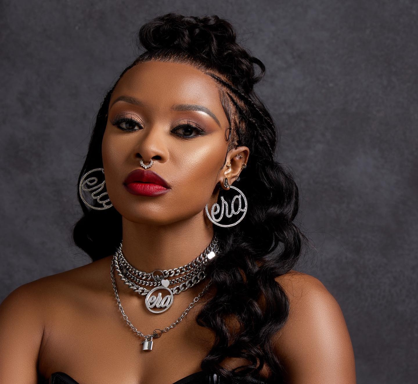 PICS: Fans speculate whether or not DJ Zinhle got a breast